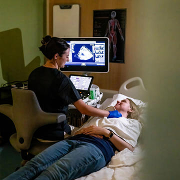 Saint Joseph's University student performing an ultrasound