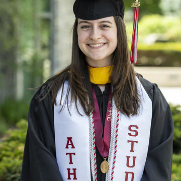 Photo of Kayla Flanders in graduation attire