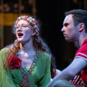 Male and Female Saint Joseph's theater students performing a play on stage