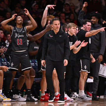 Saint Joseph's University men's basketball team with Coach Lange