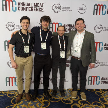 Group of Saint Joseph's University Food Marketing students are an event.