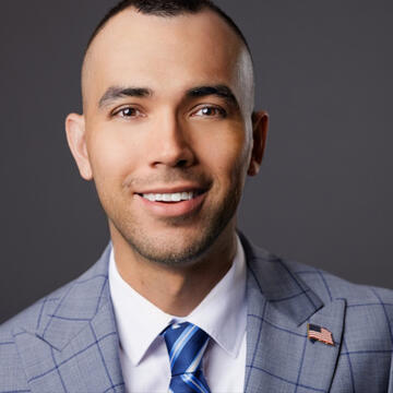 Man wearing gray suit