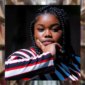 Woman with her hand under her chin