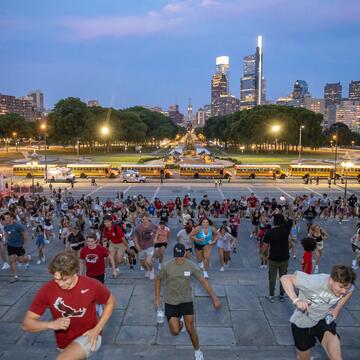 students running up stairs