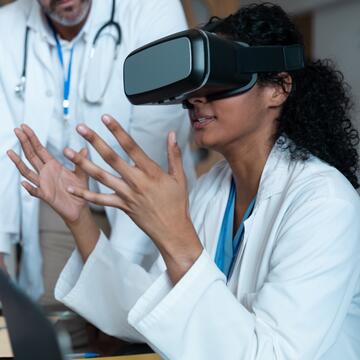 female healthcare worker using VR simulation headset