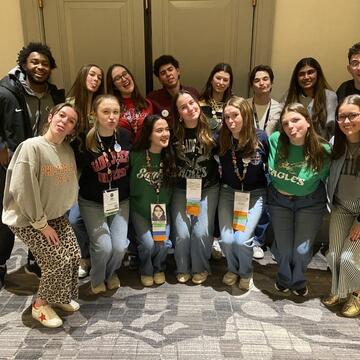 Board Smiling for Photo