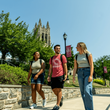 three students walking together