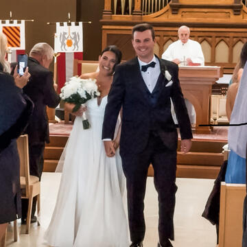 bride and groom walking down the aisle