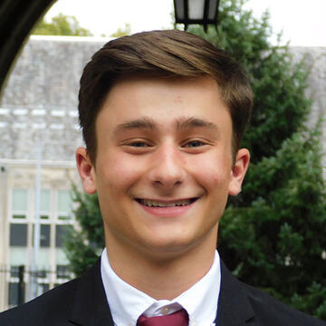 A man smiling at the camera