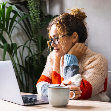 student looking at laptop