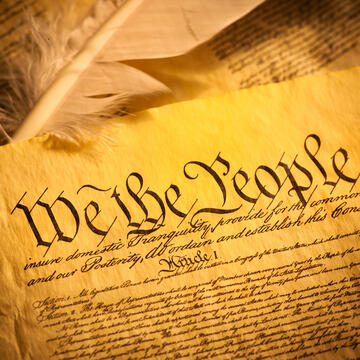 Top half of the Declaration of Independence with feather