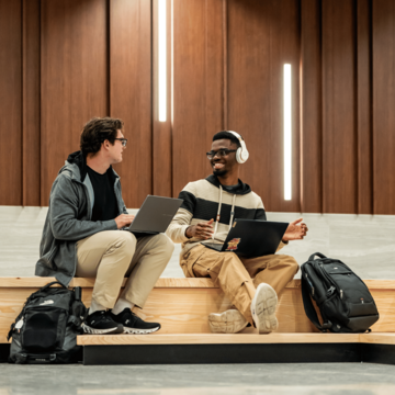 Two students sitting in a common study area in Sister Thea Bowman Hall