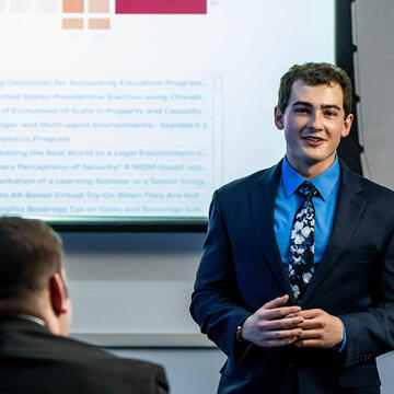 student giving presentation