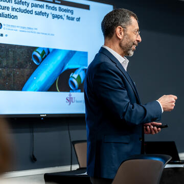 Dr. Dufresne presenting to SJU Food Marketing Students