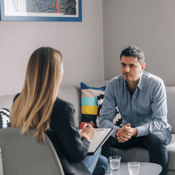 patient talking to a female counselor