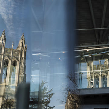 Barbelin tower reflecting on Drexel Library glass