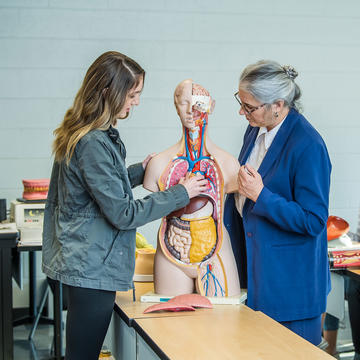 health studies student at saint joseph's university with a professor