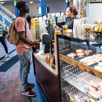 student at einsten's bagels on saint joseph's university's campus