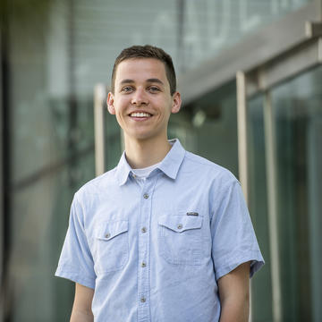 dan soucy wearing a blue collared shirt