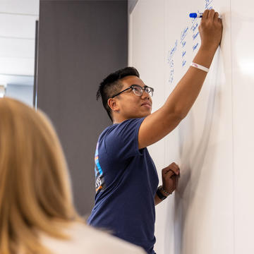 Undergraduate student working in study group on Saint Joseph's campus