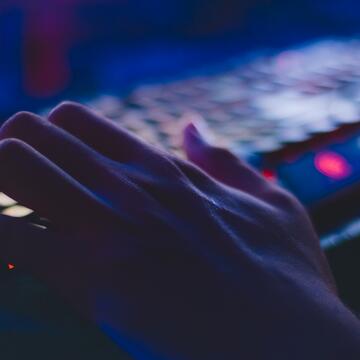 Typing on a computer keyboard.