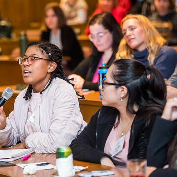 Student asks a question at LEAD seminar