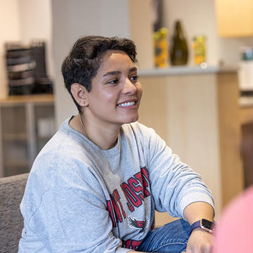 a student wearing a saint joseph's university sweater