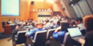 Group of participants in a conference room at the Food Industry Summit at Saint Joseph's University