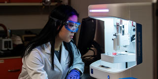 Pharmacy student immersed in hands-on lab experience