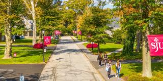 Outdoor aerial of SJU flags