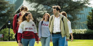 Saint Joseph's University students walking on campus near the Foley Center