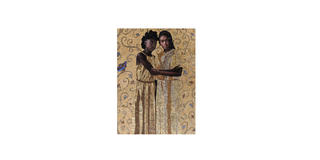 2 women in gold embracing