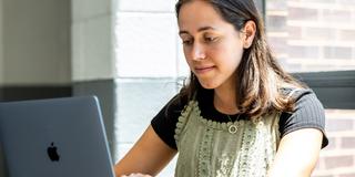 McNulty Scholar_Meadow Monticello_26_working at computer_2000 x 1300