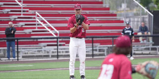 Colton Book in baseball uniform on baseball field