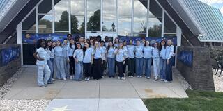 Students Smiling at Photo