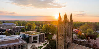 aerial shot of saint joseph's university with the sun setting in the background