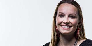 Maddi looks directly at the camera