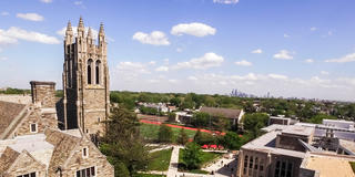 Aerial view of Saint Joseph's University campus with Philadelphia skyline in the background