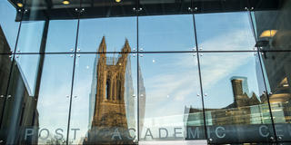 Barbelin Tower at Saint Joseph's University reflection in the Drexel Library window