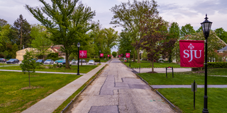 SJU banners on campus street