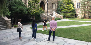 Individuals on a campus tour at Saint Joseph's University
