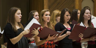 saint joseph's university students singing in the choir