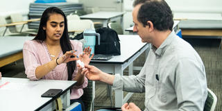 Saint Joseph's Occupational Therapy professor with student in class