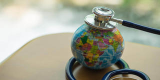 stethoscope on a globe