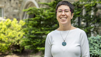 Encarna Rodríguez, Ph.D., in the Barbelin Courtyard