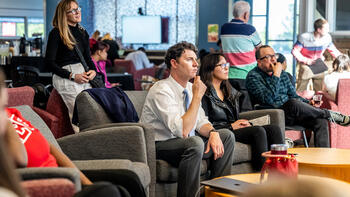 A group of teachers sitting in a lounge