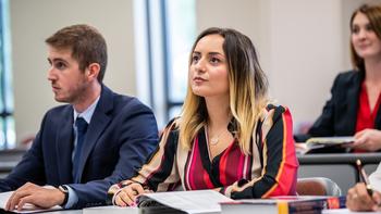 graduate students at saint joseph's university inside a classroom