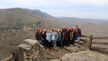 A group of students pose at the appalachian mountains