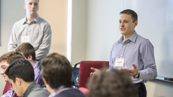 business student pitching in a classroom