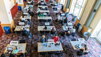 A photo of study tables in the library taken from above